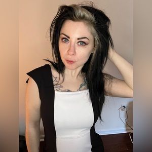 Black and white sleeveless striped mini dress